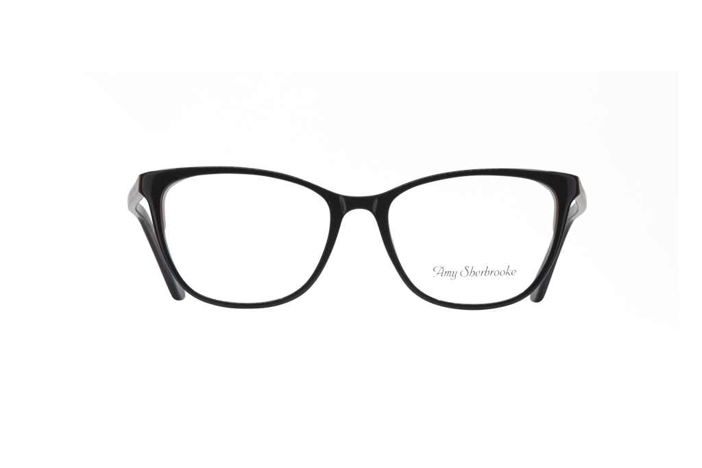 Black rectangular eyeglasses with a dark frame, shown against a gray geometric backdrop; subtle signature text appears on the right lens.