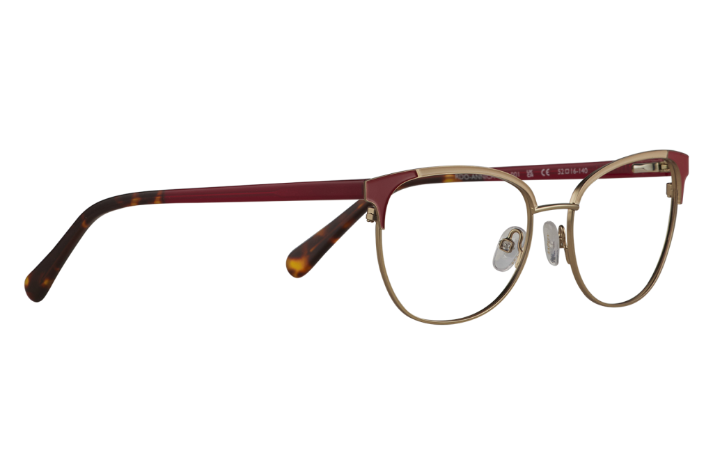 Pair of red-and-gold eyeglasses with tortoiseshell temples and clear nose pads