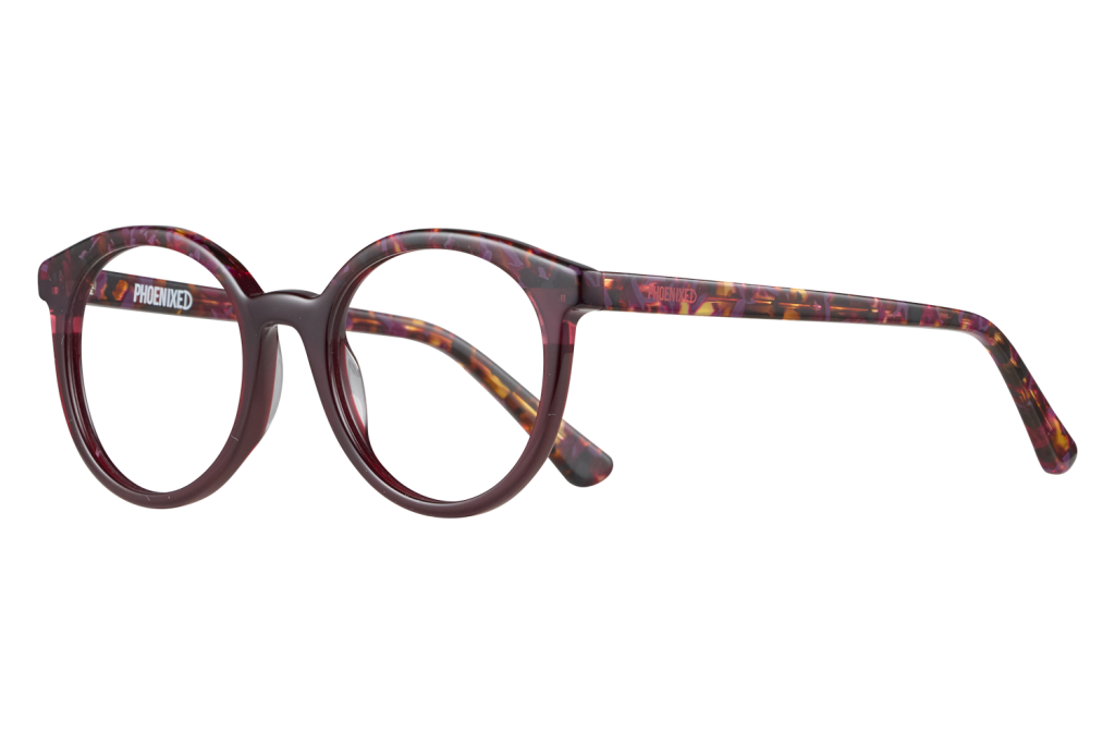 Round burgundy tortoiseshell eyeglasses with patterned temples on a gray surface. (informative)