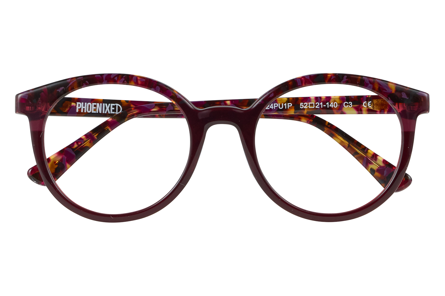 Purple tortoiseshell eyeglasses with 'PHOENIXED' on the temple, resting on a clear block.