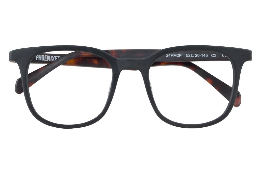 Front view of black tortoiseshell eyeglasses resting on a clear pedestal, with brand text visible on the temple edge.