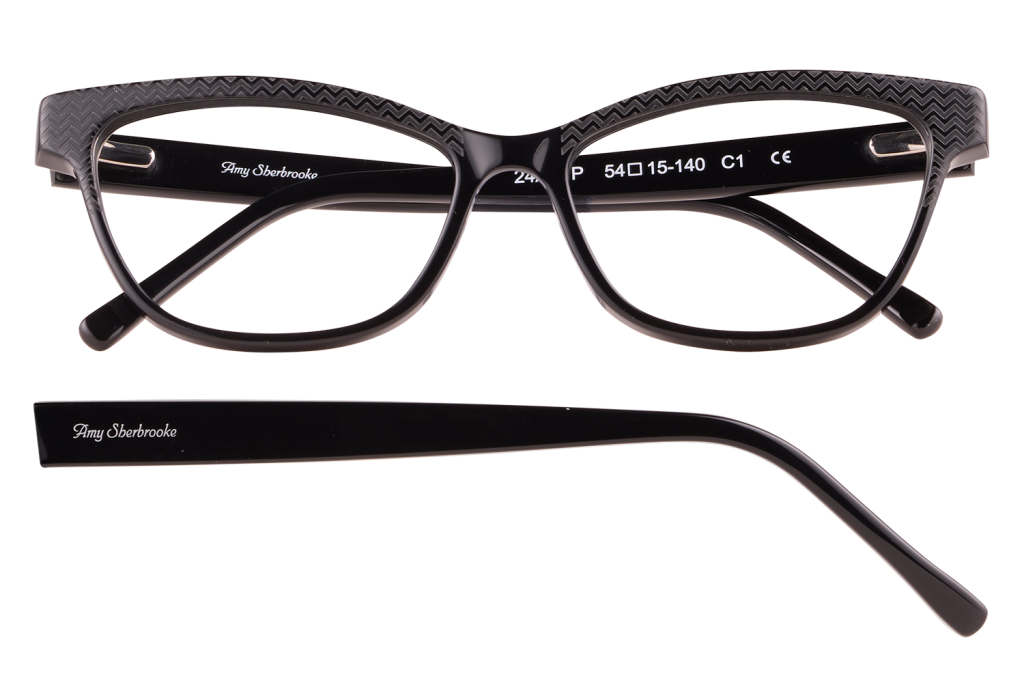 Black plastic eyeglasses with a textured zigzag pattern on the frame and Amy Sherbrooke branding on the armanel