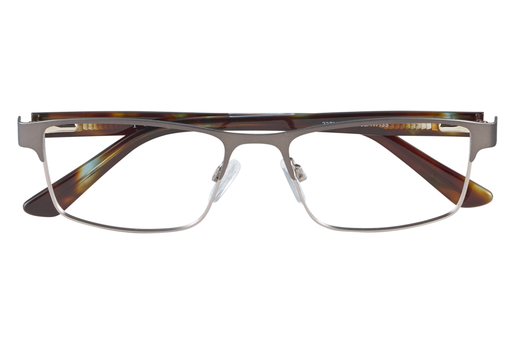 Rectangular metal-frame eyeglasses with tortoiseshell temples resting on a clear glass stand against a light background.