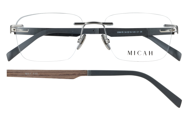 Rimless glasses with a thin metal frame, adjustable nose pads, dark temple arms, and MICAH branding on the lenses/arms.