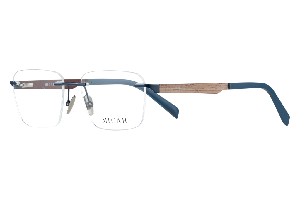 Close-up of transparent eyeglasses with blue metal frame and wood-accented temples, Micah logo on the lens area.