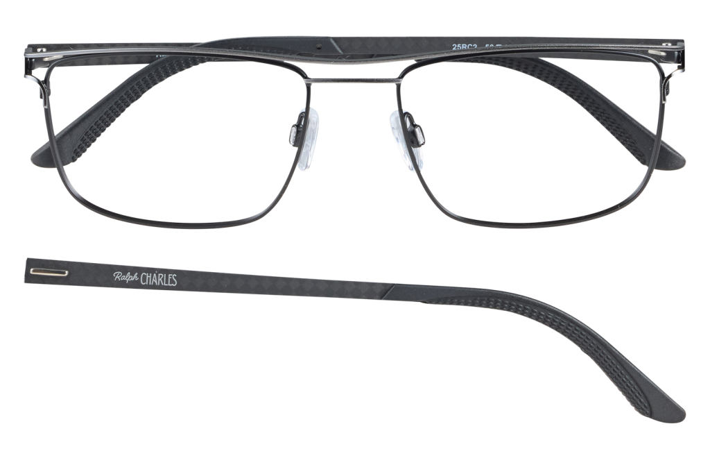 Black metal-frame rectangular eyeglasses with clear nose pads and a branded second temple piece labeled Ralph Charles