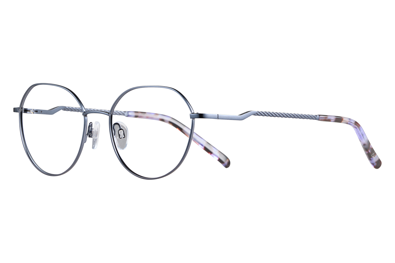 Close-up of round metal eyeglasses with clear nose pads and twisted temples on a neutral surface.