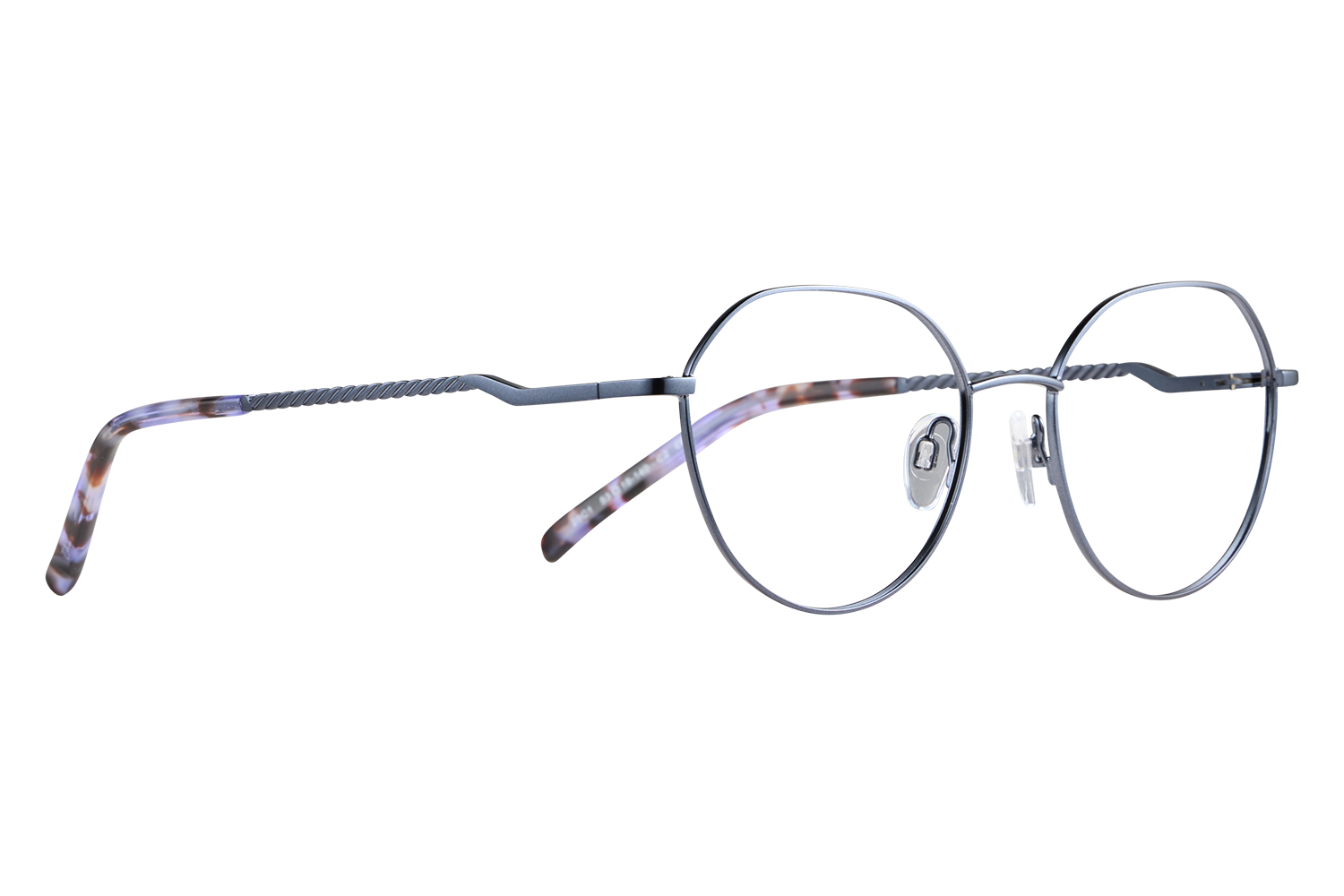 Round metal eyeglasses with tortoiseshell-accented temples resting on a light surface.