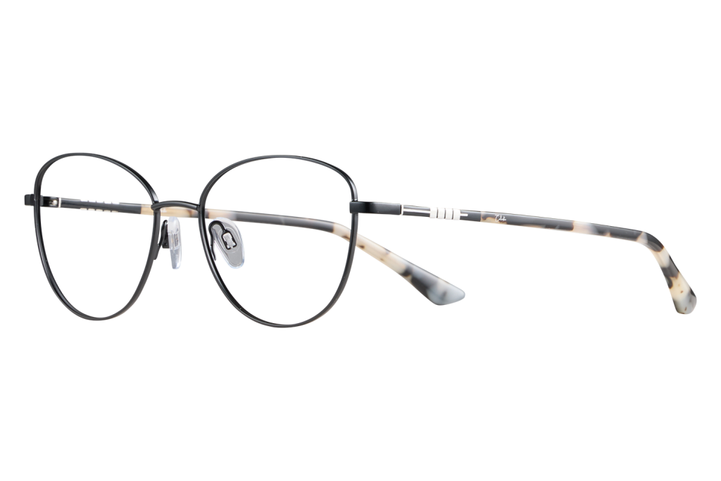 Black round‑frame glasses with tortoiseshell temples shown in close‑up on a gray background, highlighting nose pads and metal bridge detail.
