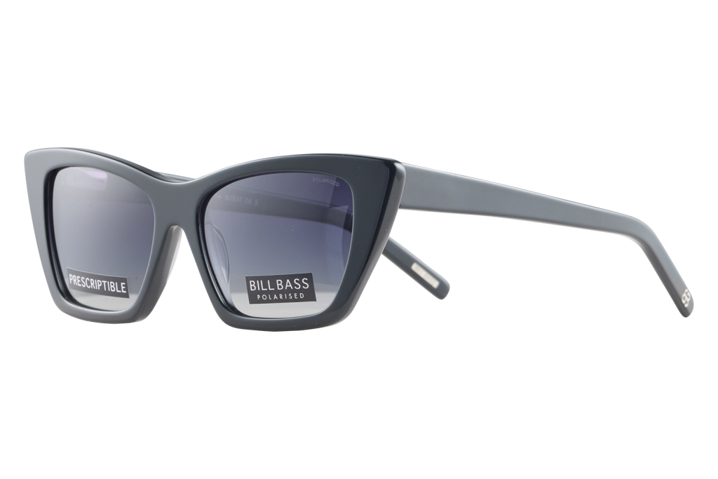 Gray plastic sunglasses with dark polarized lenses and wide, rectangular frame; brand labels visible on lens.