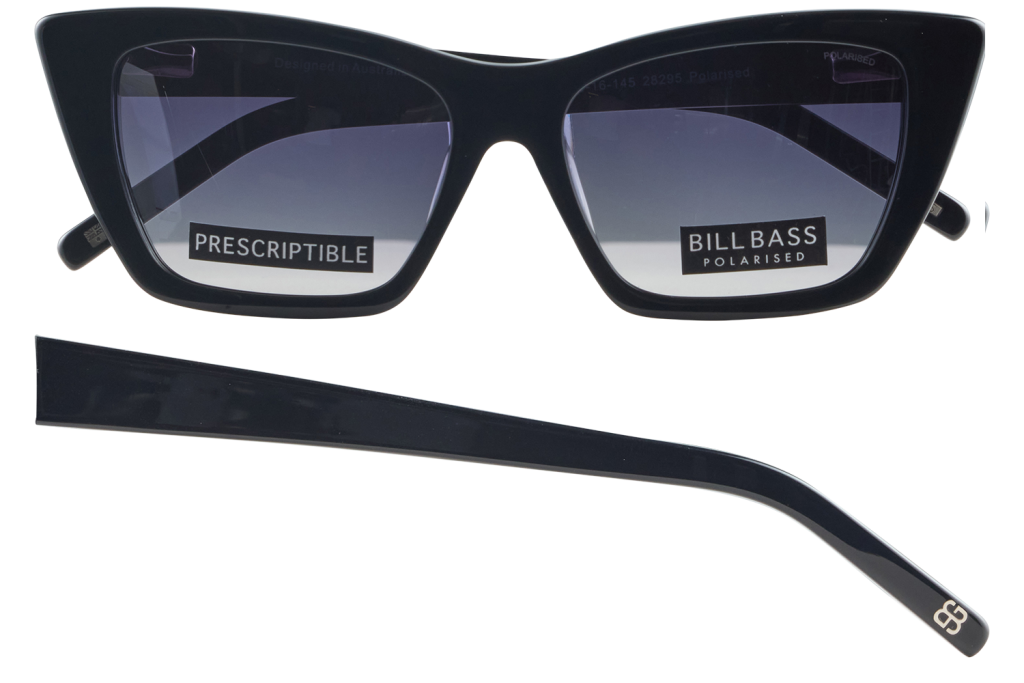 Black rectangular-frame sunglasses with polarized lenses and a detachable temple arm placed below the frame.