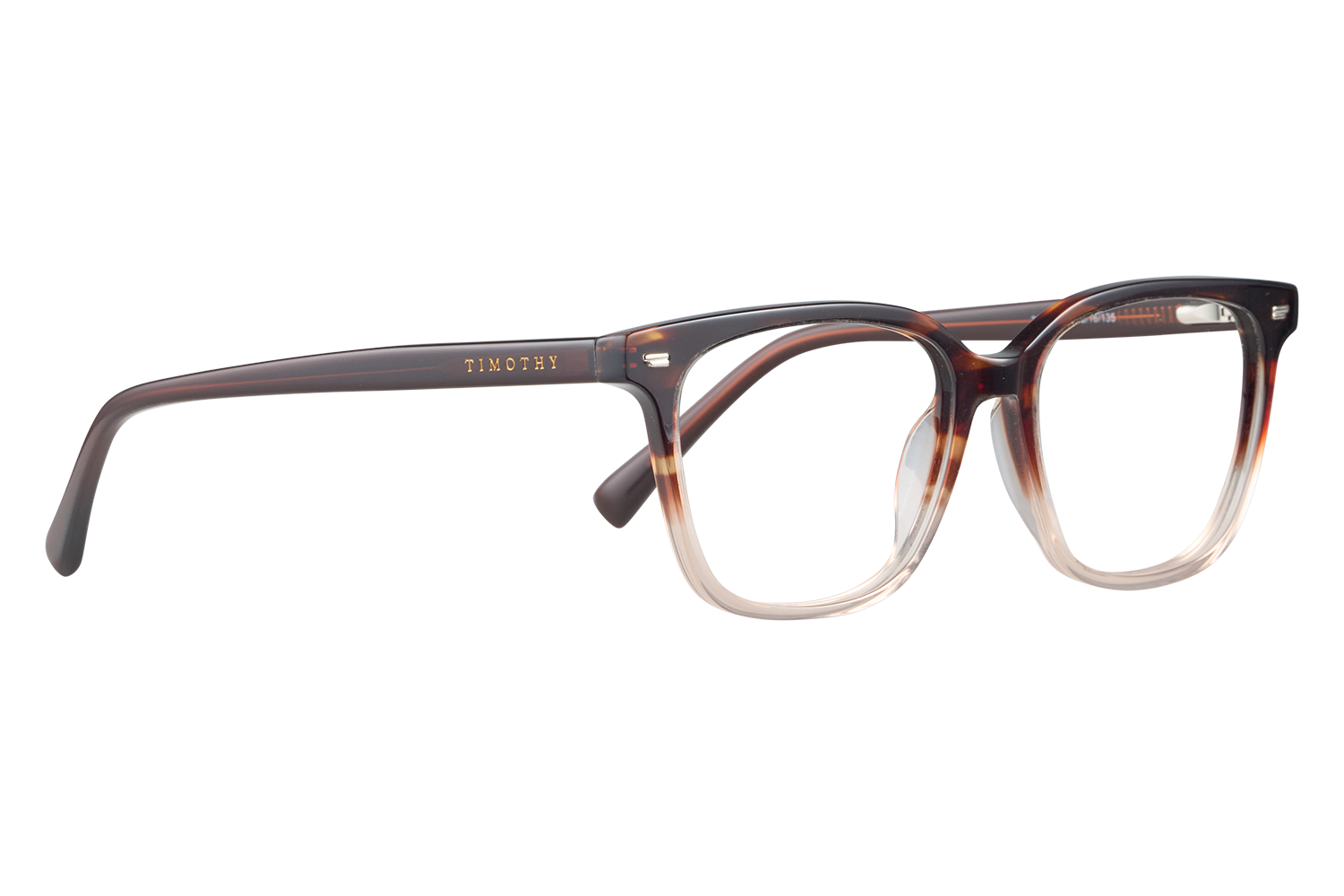 Tortoiseshell eyeglasses with gold TIMOTHY branding on the temple, close-up on a white surface.