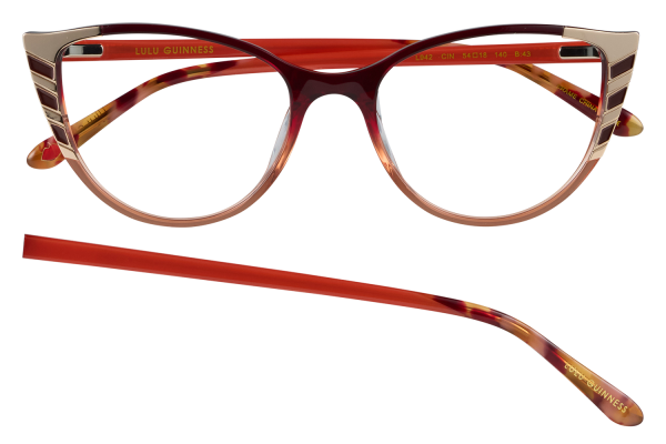 Red tortoiseshell eyeglasses with gold accents; front view, Lulu Guinness branding on the temple and a detached temple arm beneath.