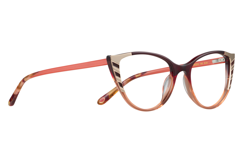 Fashionable orange and tortoiseshell eyeglasses with metallic accents on the frame edge.