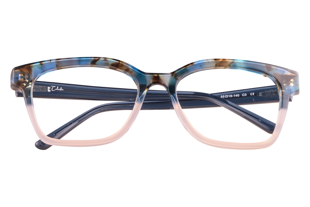 Front view of blue-gradient tortoiseshell eyeglasses on a clear display stand.