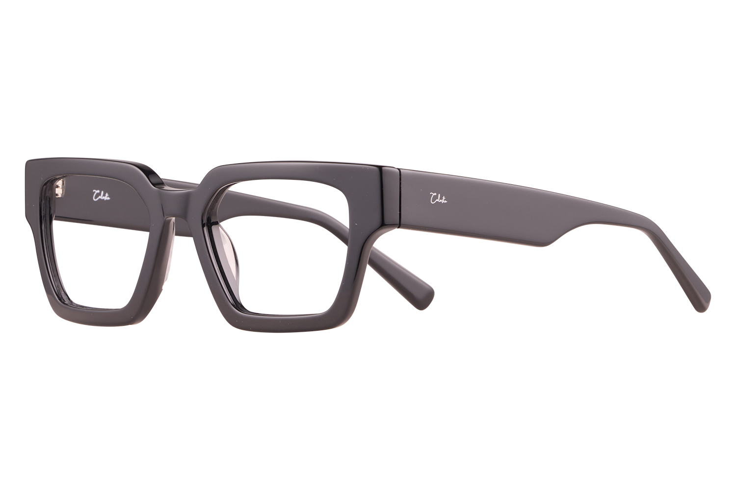 Pair of thick, rectangular black eyeglasses resting on a light surface, seen from the side with one temple extended outward.