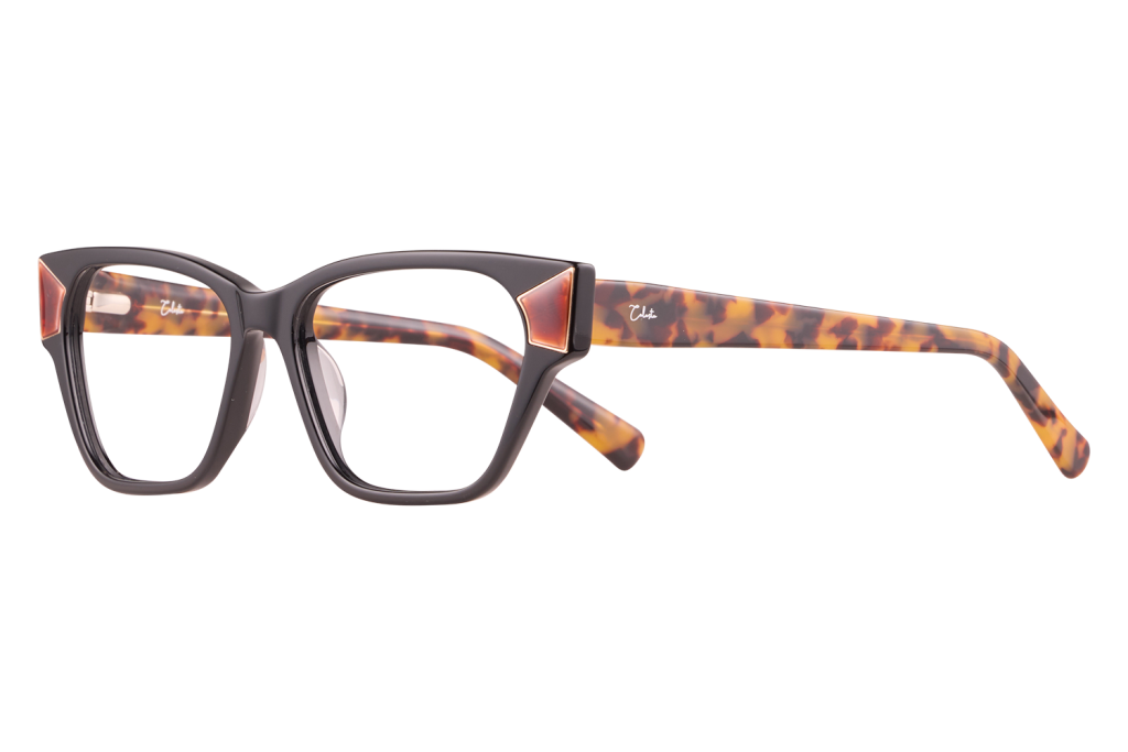 Black-frame eyeglasses with tortoiseshell temples and a small pink accent at the hinges.