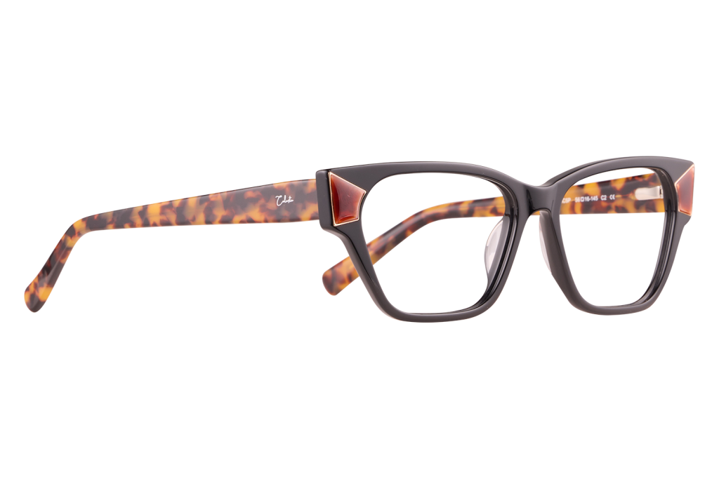 Black front eyeglasses with tortoiseshell patterned temples and red triangular accents near the hinges