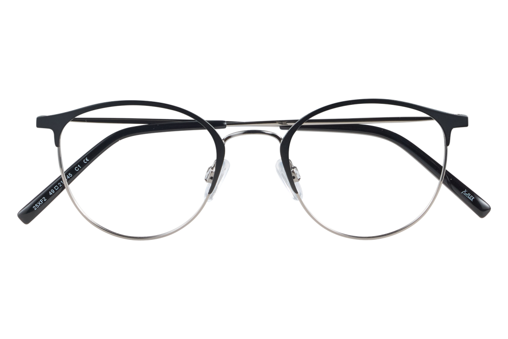 Eyeglasses with round metal frames and dark upper rims resting on a clear glass stand.