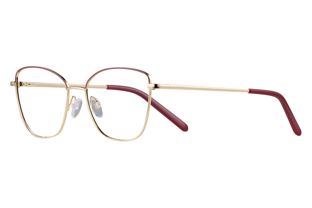 Gold metal eyeglasses with red temple tips, close-up side view on gray background.