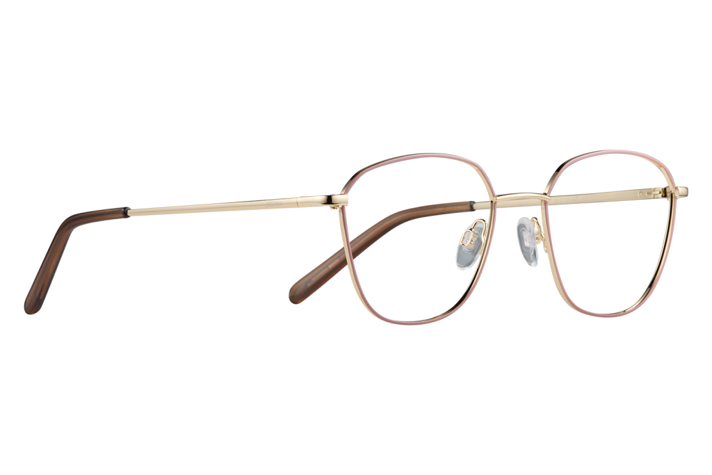 Gold and pink-rimmed metal eyeglasses with nose pads on a gray background.
