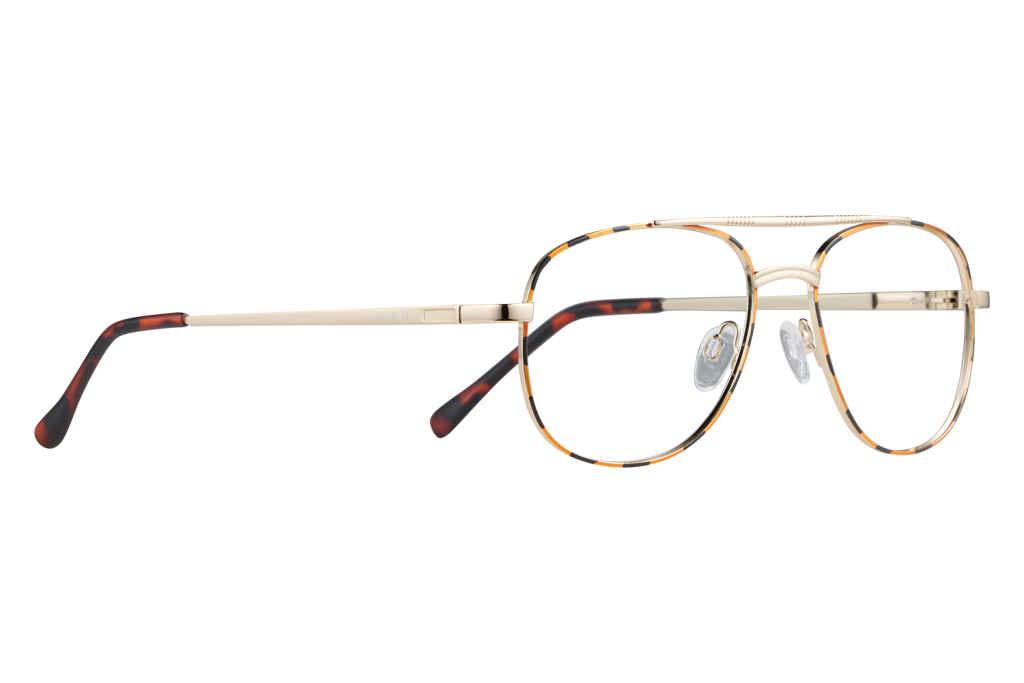 Pair of tortoiseshell and gold eyeglasses resting on a flat surface with clear nose pads visible on a gray background, close-up.