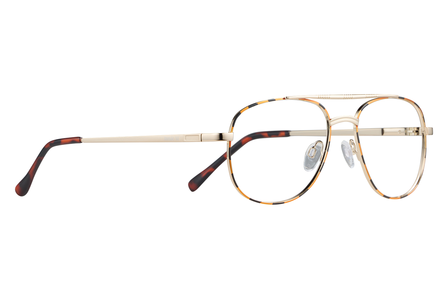 Pair of tortoiseshell and gold eyeglasses resting on a flat surface with clear nose pads visible on a gray background, close-up.