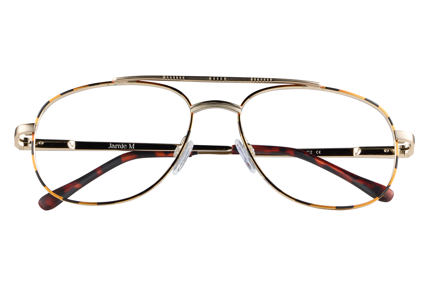 Gold metal-rimmed eyeglasses with tortoiseshell temples resting on a small clear stand. (Display photo)
