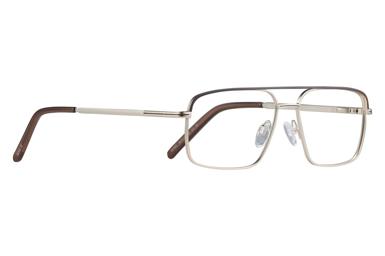 Pair of metal-rimmed glasses with beige and brown frame lying on a light surface against a gray background.