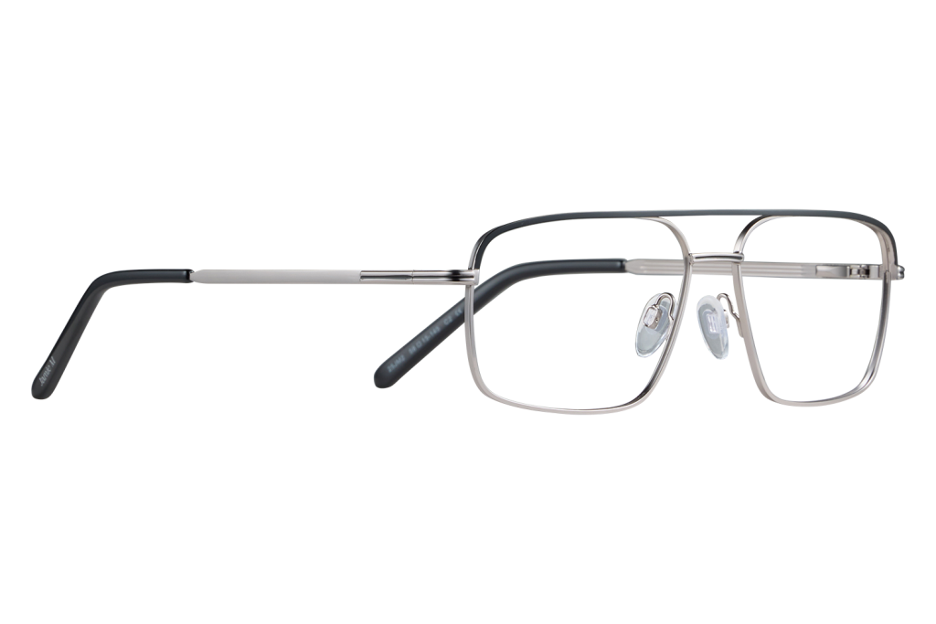 Rectangular metal-framed eyeglasses with clear lenses and black temple tips on a light gray surface; close-up view of nose pads and frame.