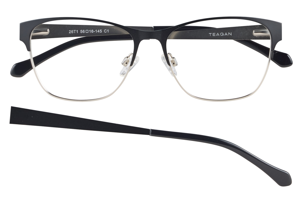 Black Teagan eyeglasses with a thin metal rim, adjustable nose pads, and one temple detached below the frame.