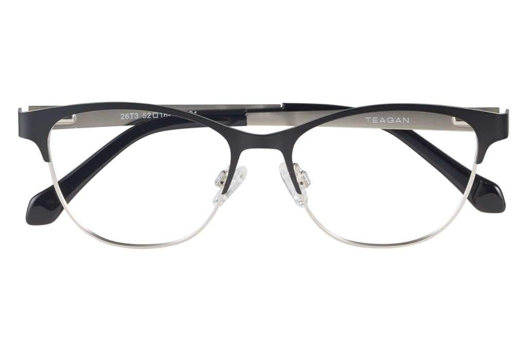 Black eyeglasses with a half-rabric, metal-rimmed lenses resting on a clear display stand; TEAGAN branding visible on the temple (front view).] }```Oops``` Wait format. Provide proper JSON. Let's craft three options. Ensure under 125 chars. Let's redo. Also ensure not to include bracket error. Provide valid JSON. Let's output.