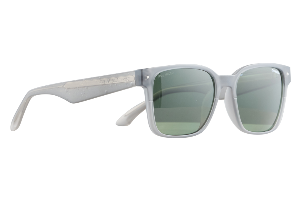 Gray-framed sunglasses with green polarized lenses resting on a white surface; O'Neill branding on the temple.