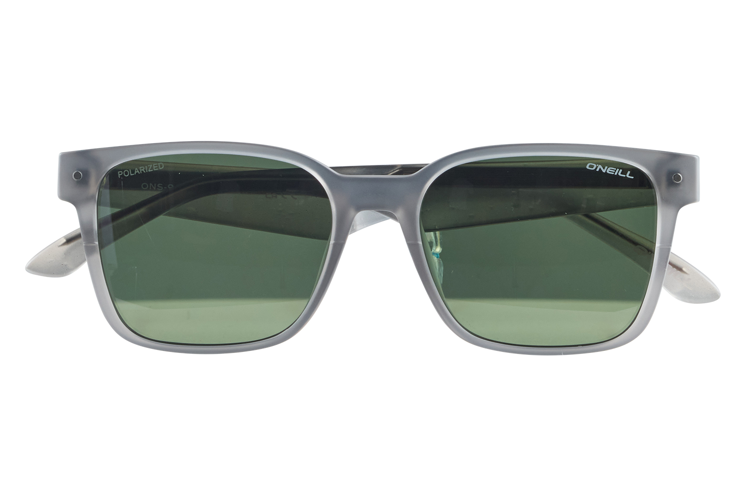 Gray-framed sunglasses with green lenses resting on a small clear stand against a white background (brand: O'Neill).