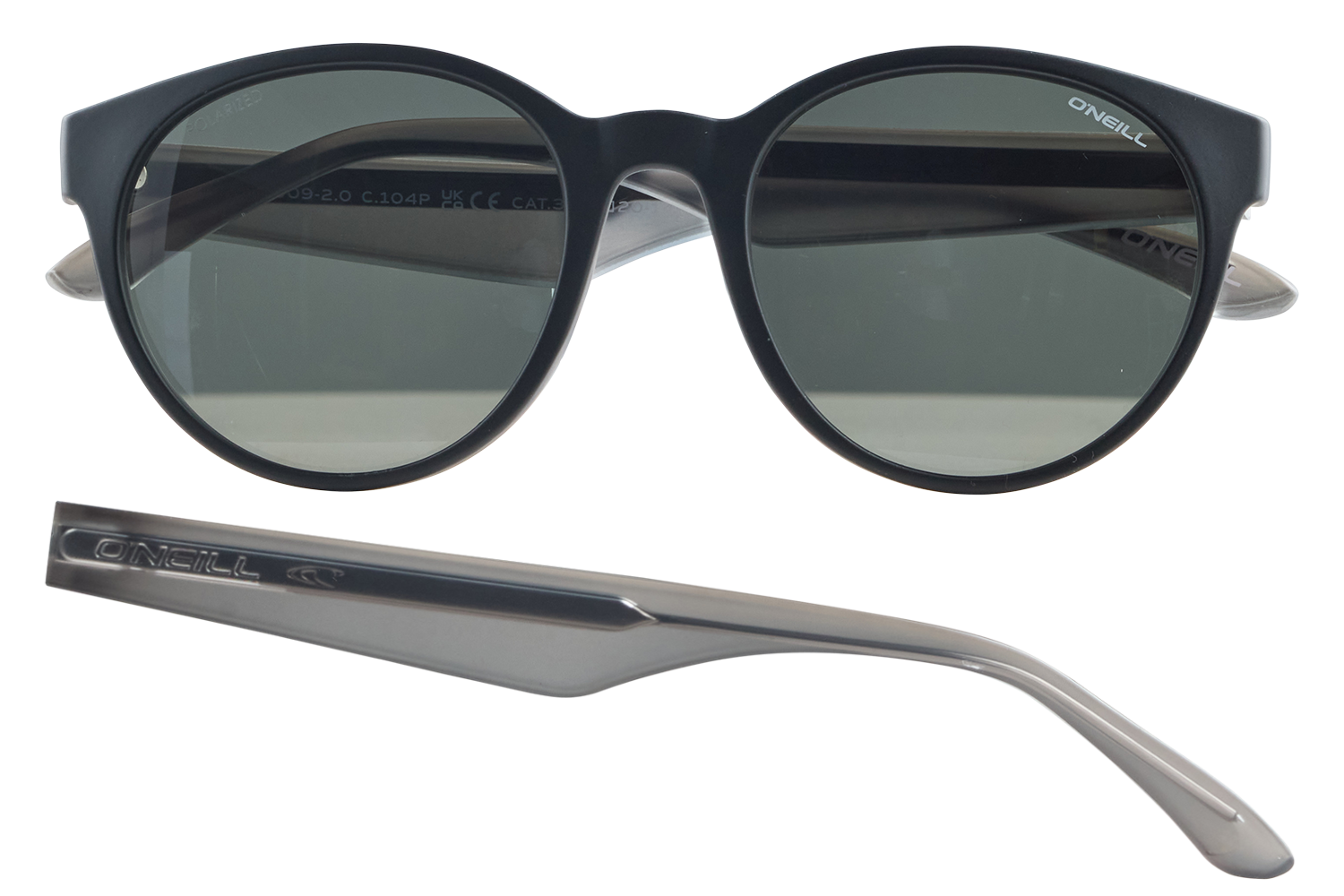 Black round sunglasses with gray-green lenses and a detachable silver temple arm branded O’Neill.