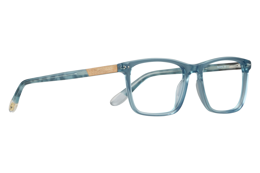 Blue translucent eyeglasses with a wood inlay on the temple, resting on a white surface.